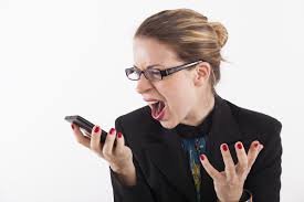 Angry white female holding cell phone